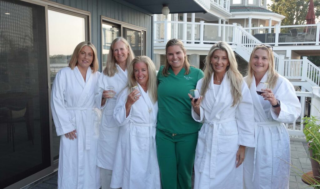 New Jersey spa party events with massage therapist and guests relaxing and having fun